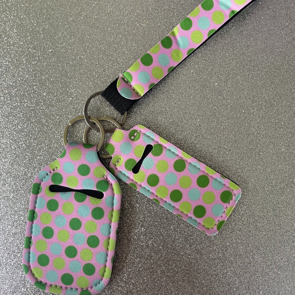 NWOT 3 Piece Neoprene Wristlet, Sanitizer and Lip Balm Holder Keychain Set